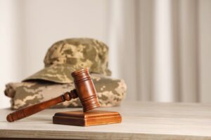 In the context of law, an image might depict a gavel alongside a military uniform on a wooden table, with space provided for text.